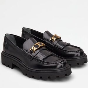 Tod's Fringed Loafers in Black Leather- size 37.5